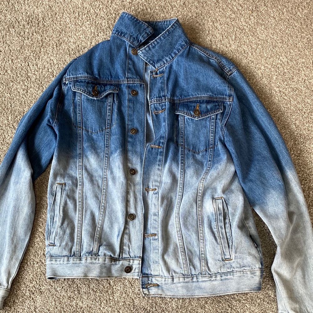 Brooklyn Clothing multi color jean jacket. Size large.
